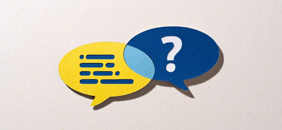 A yellow and blue speech bubble overlapping on a white background. The white one has dots on it, and the blue one has a question mark.